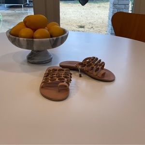 Ionannis sandal. Tan color, leather with carved stone accents. Size 7